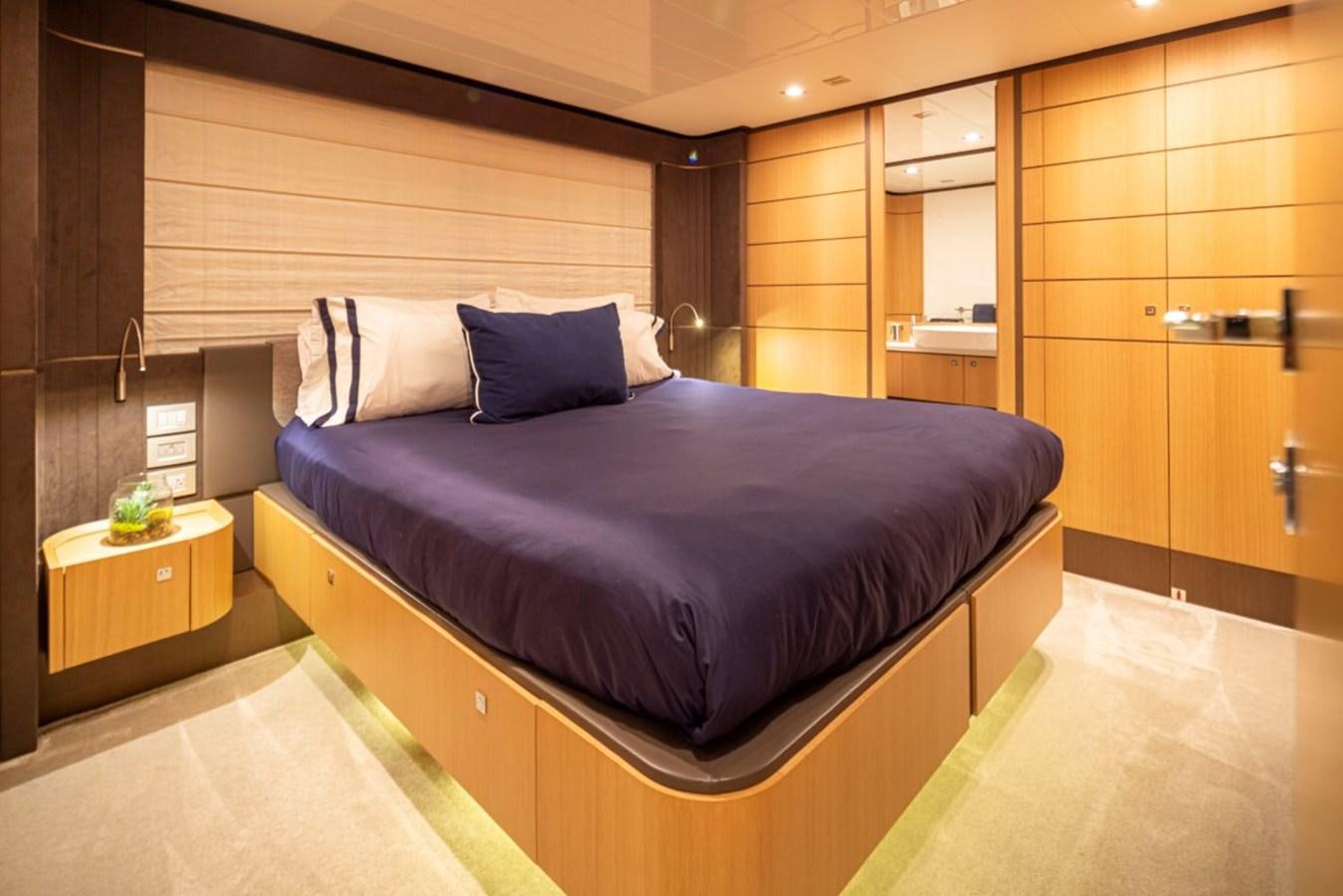 a bed in a room aboard SOL SHINE Yacht for Sale