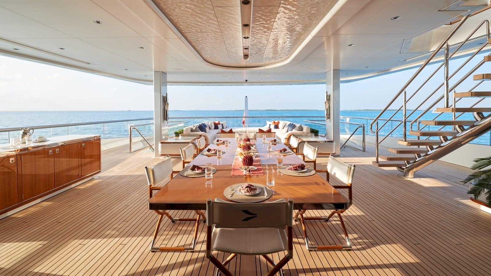 a room with a table and chairs aboard ARROW Yacht for Charter