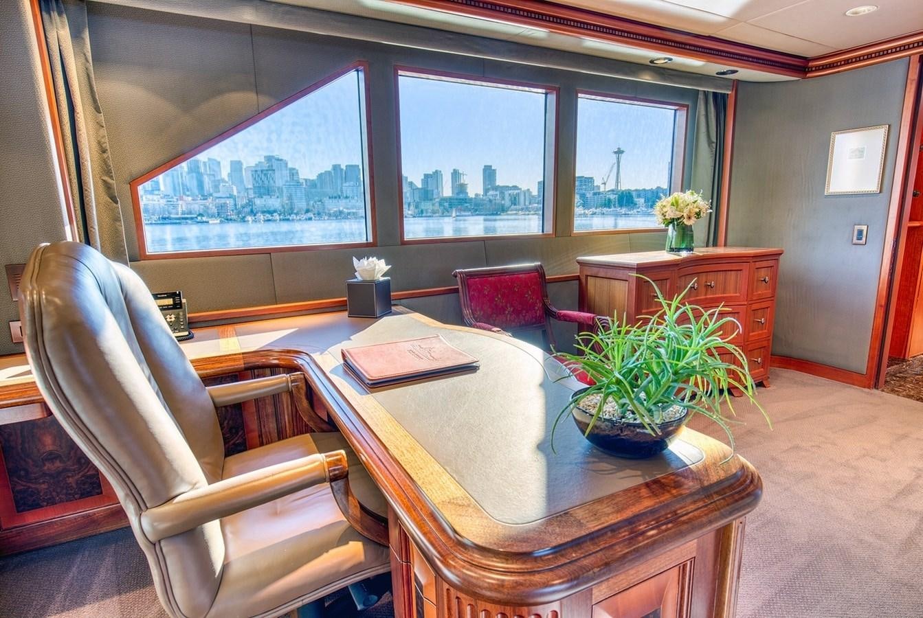 a dining room with a table and chairs aboard ICE BEAR Yacht for Sale