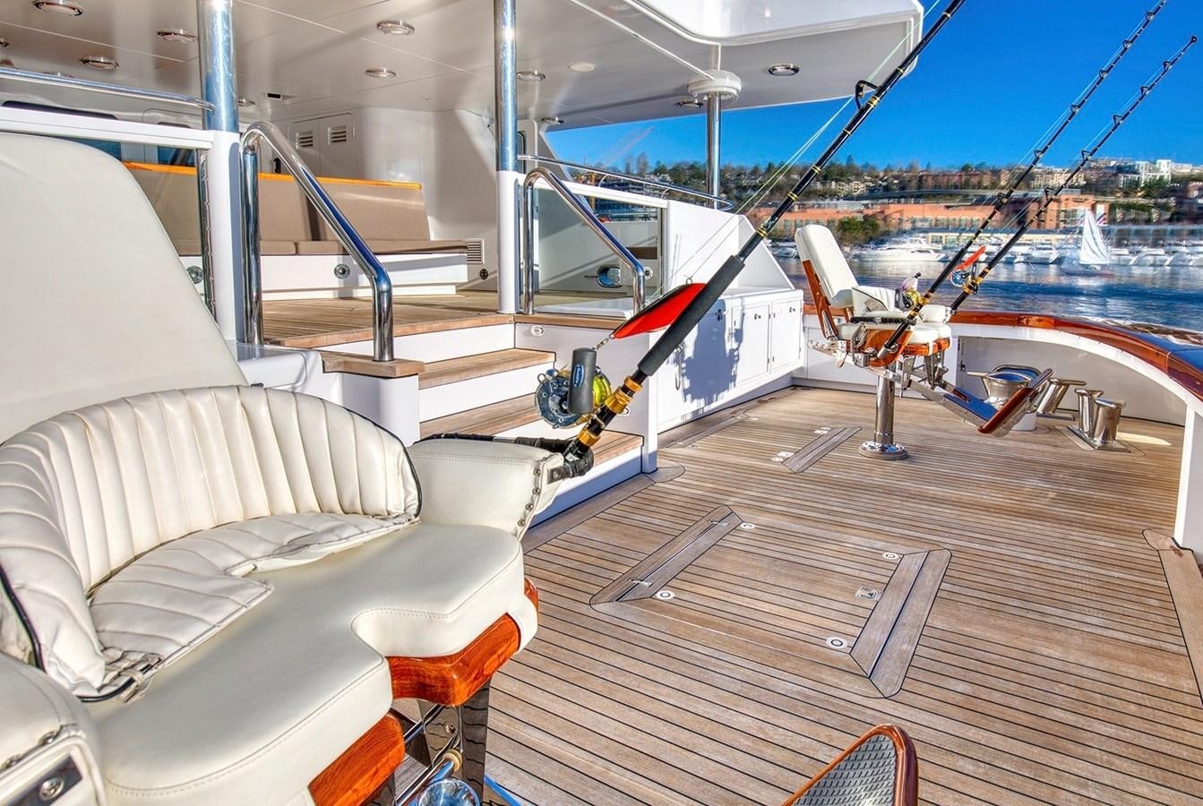 a boat deck with a deck and a chair on it aboard ICE BEAR Yacht for Sale