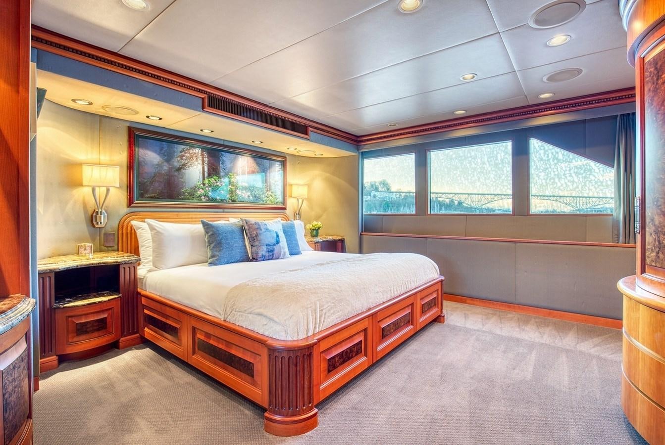 a large bedroom with a large bed aboard ICE BEAR Yacht for Sale