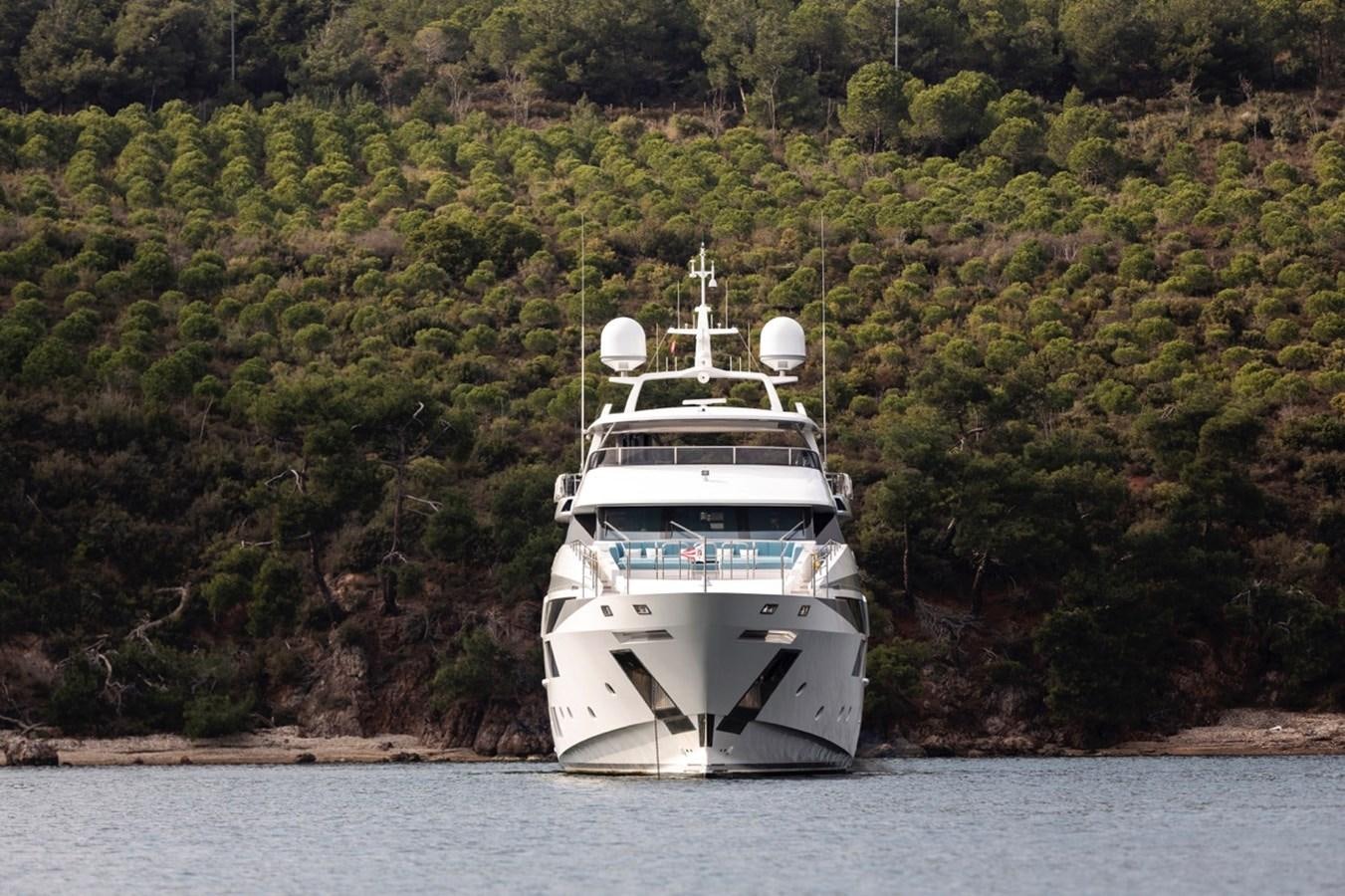 a large white ship on the water aboard CHARADE Yacht for Sale