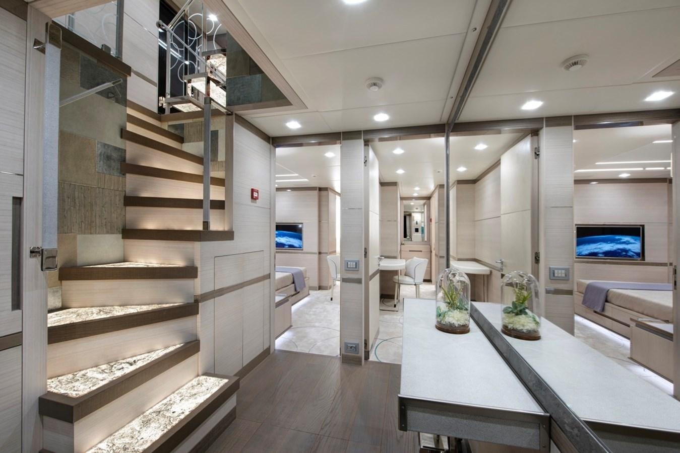 a modern looking room with a staircase aboard CHARADE Yacht for Sale