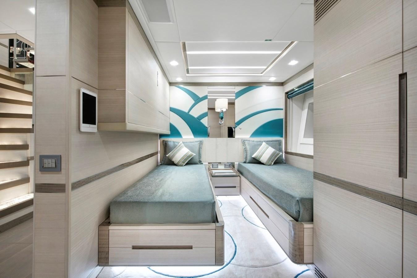 a room with a couch and a bed aboard CHARADE Yacht for Sale