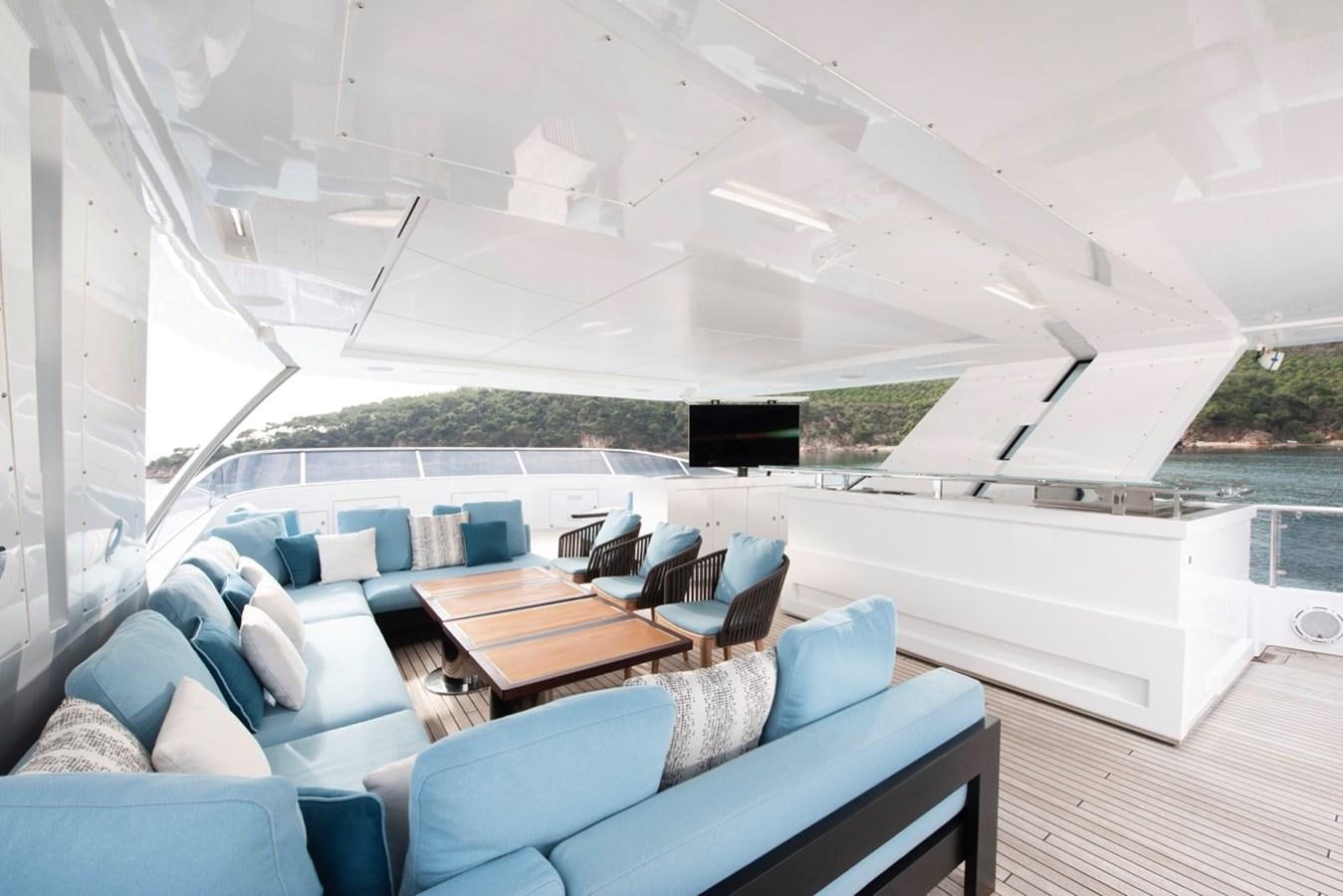 a modern house with a large patio aboard CHARADE Yacht for Sale