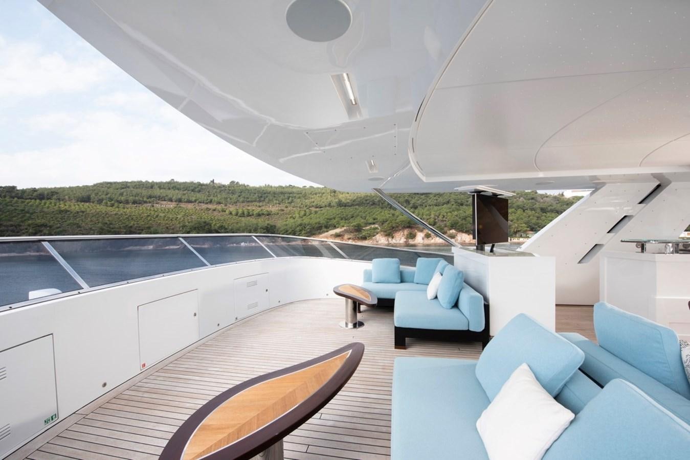 a room with a large balcony aboard CHARADE Yacht for Sale