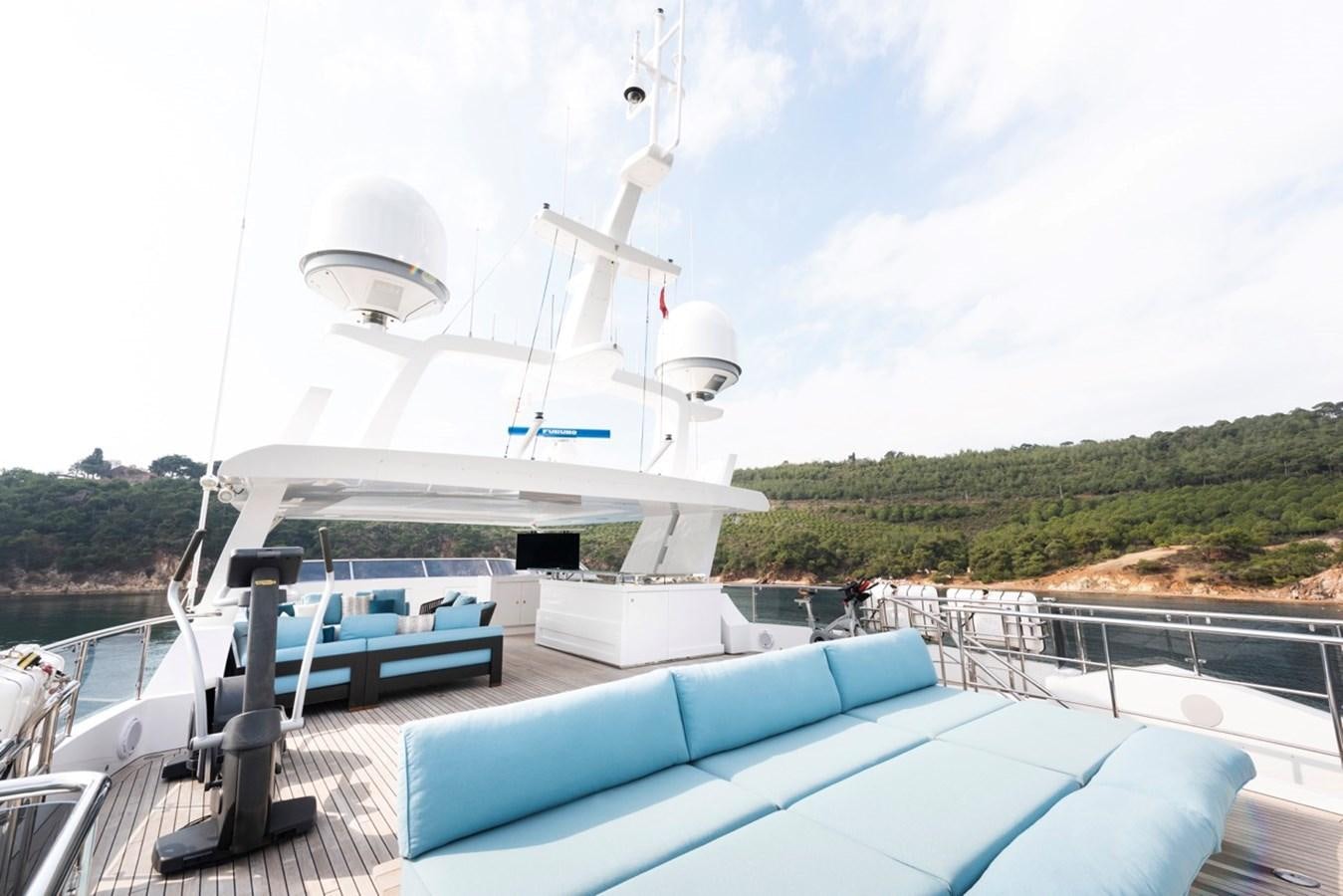 a boat docked at a pier aboard CHARADE Yacht for Sale