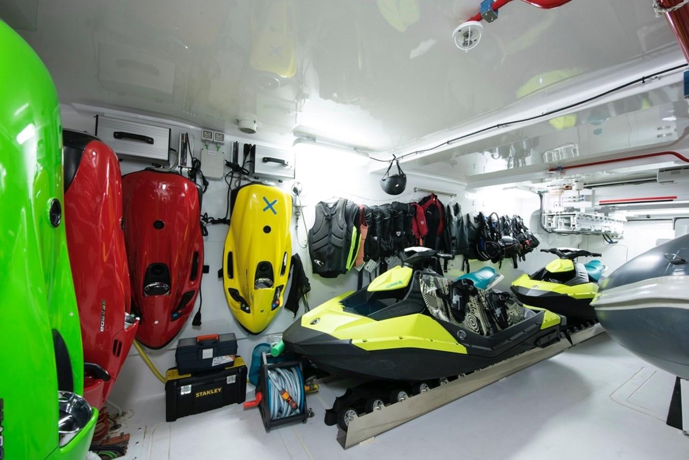 a group of surfboards in a room aboard CHARADE Yacht for Sale