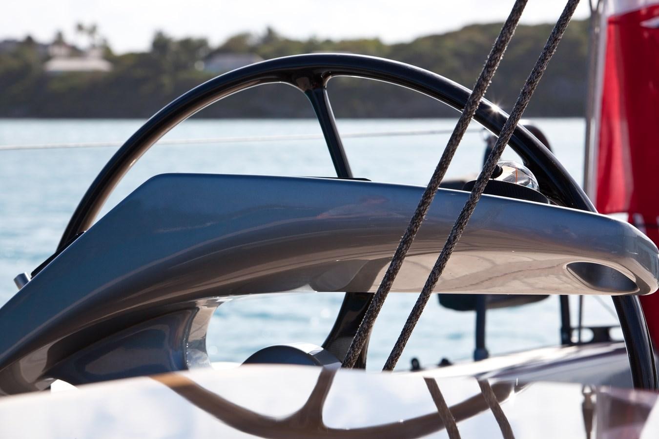 a steering wheel and steering wheel of a boat aboard AEGIR Yacht for Sale