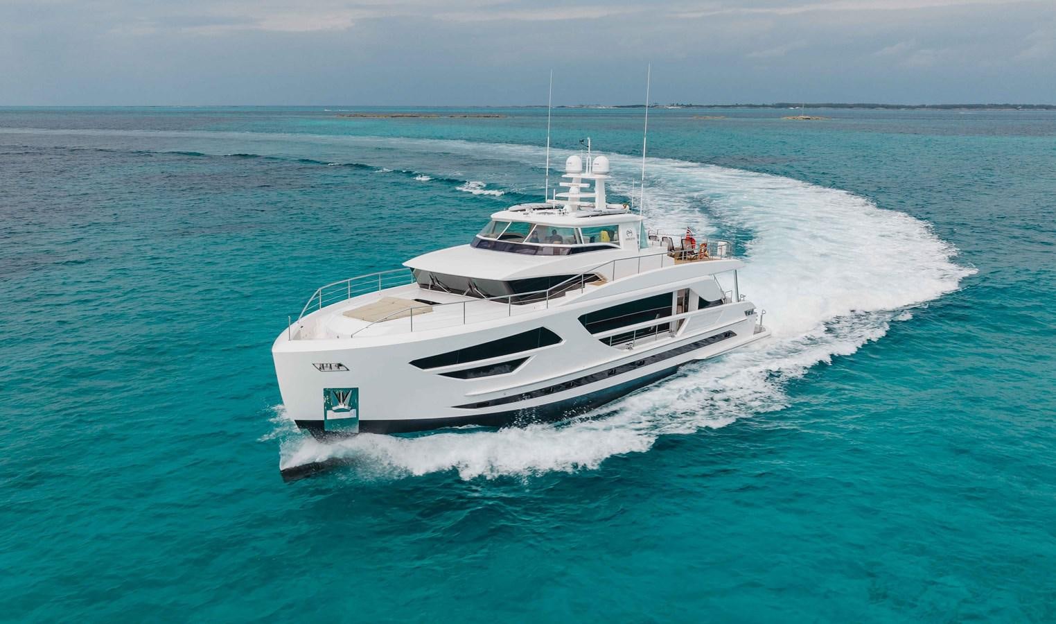 a white boat on the water aboard MIDNIGHT MOON Yacht for Sale