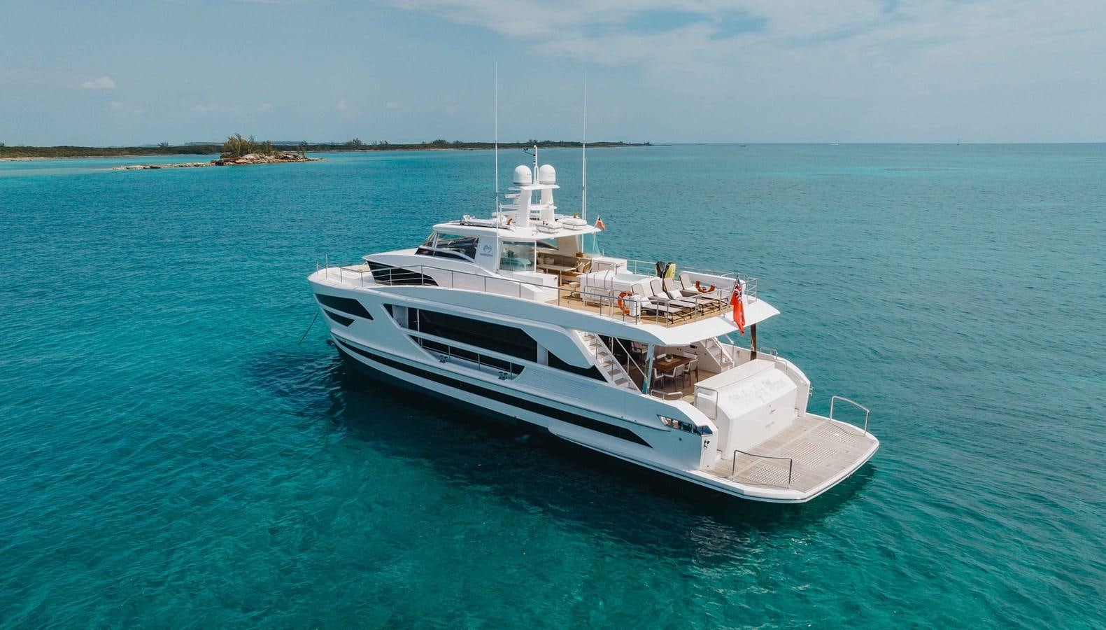 a white boat in the water aboard MIDNIGHT MOON Yacht for Sale