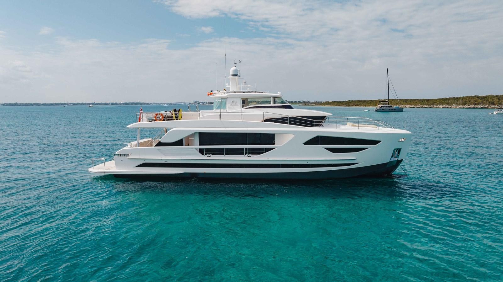 a white boat in the water aboard MIDNIGHT MOON Yacht for Sale