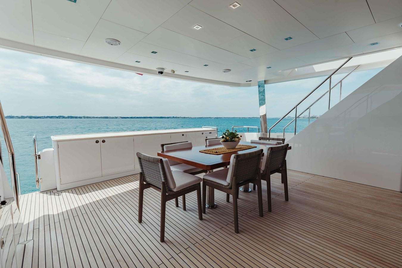 a room with a table and chairs aboard MIDNIGHT MOON Yacht for Sale