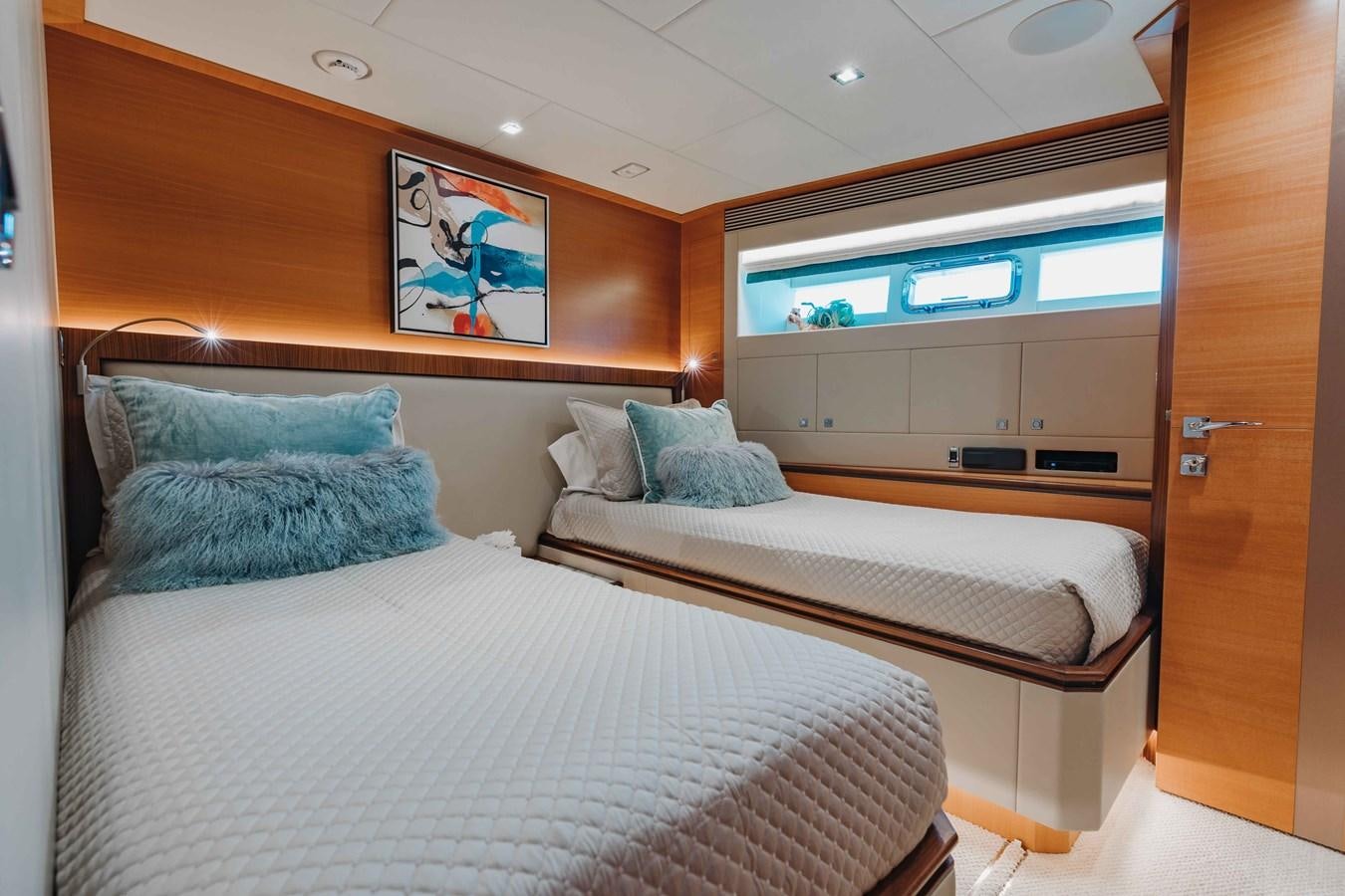 a room with two beds aboard MIDNIGHT MOON Yacht for Sale