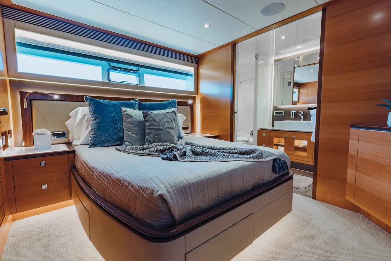 a bed in a room aboard MIDNIGHT MOON Yacht for Sale