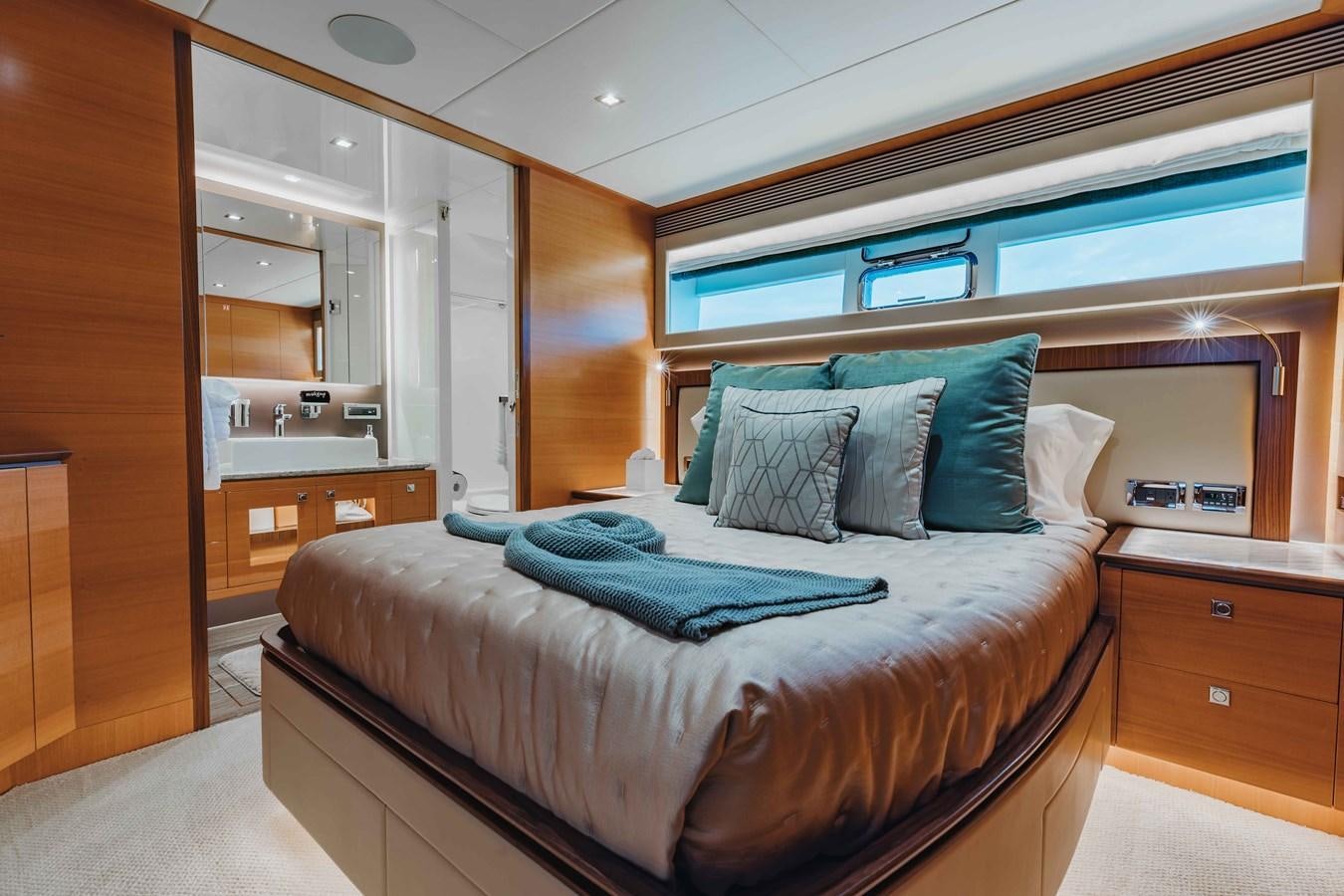 a bed in a room aboard MIDNIGHT MOON Yacht for Sale