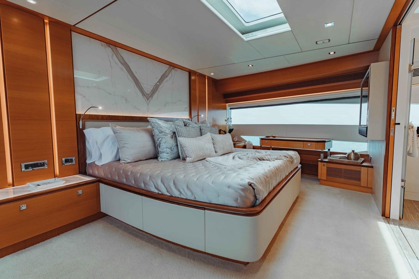a bed in a room aboard MIDNIGHT MOON Yacht for Sale