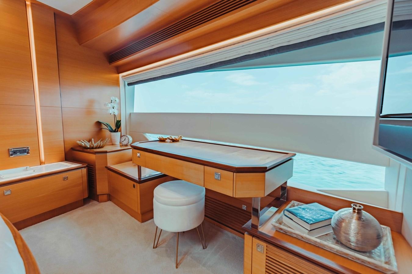 a room with a desk and a window aboard MIDNIGHT MOON Yacht for Sale