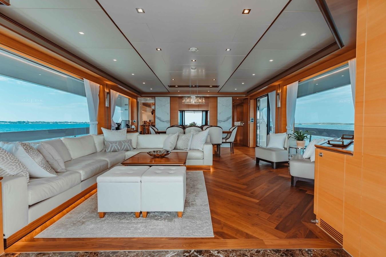 a living room with a wood floor aboard MIDNIGHT MOON Yacht for Sale