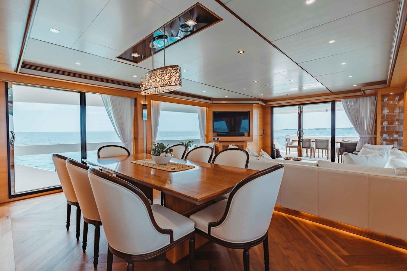 a dining room with a large table aboard MIDNIGHT MOON Yacht for Sale