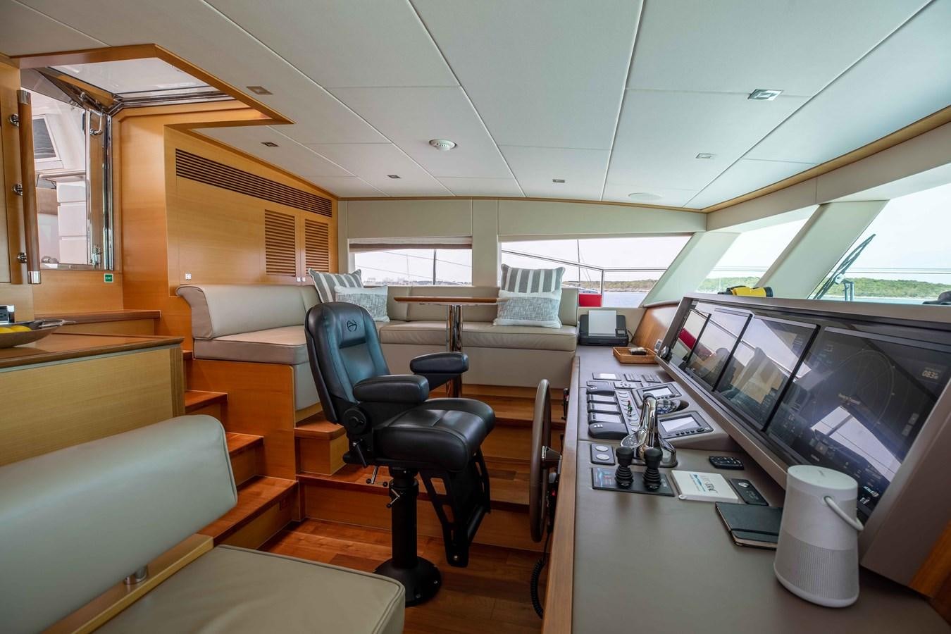an office with a desk and computer aboard MIDNIGHT MOON Yacht for Sale
