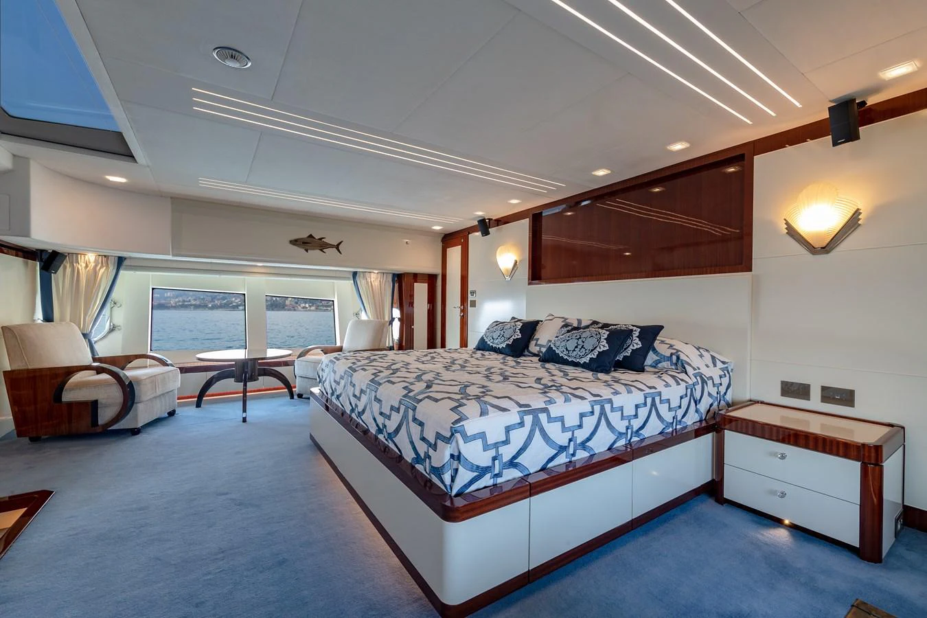 a large bedroom with a large bed aboard LADY MARISA Yacht for Sale