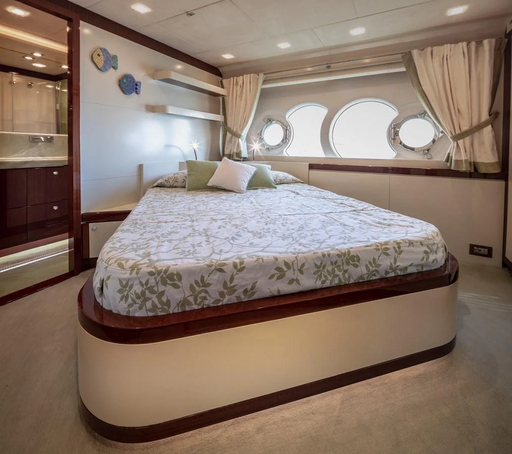 a bed in a room aboard LADY MARISA Yacht for Sale