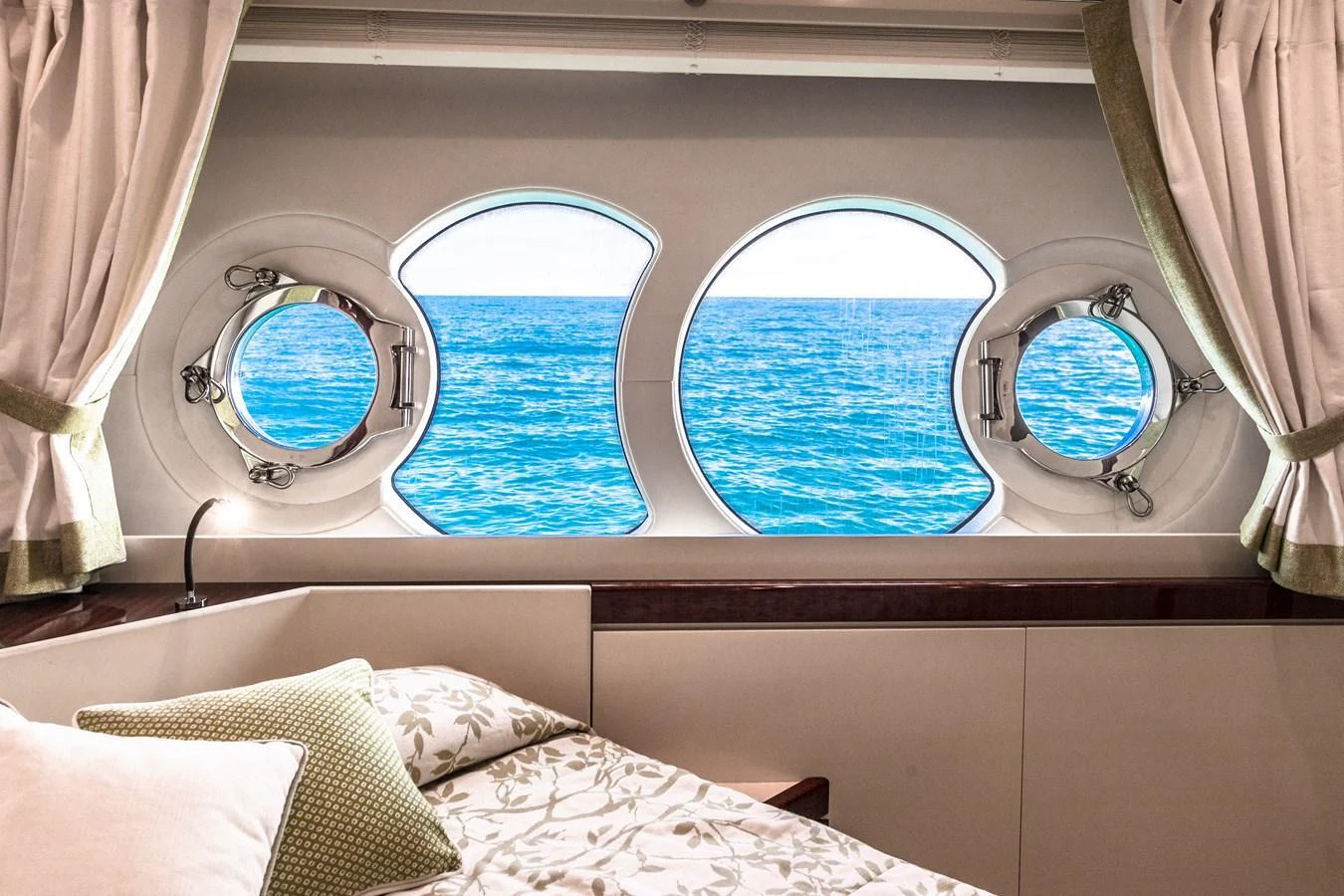 a room with a bed and a window aboard LADY MARISA Yacht for Sale