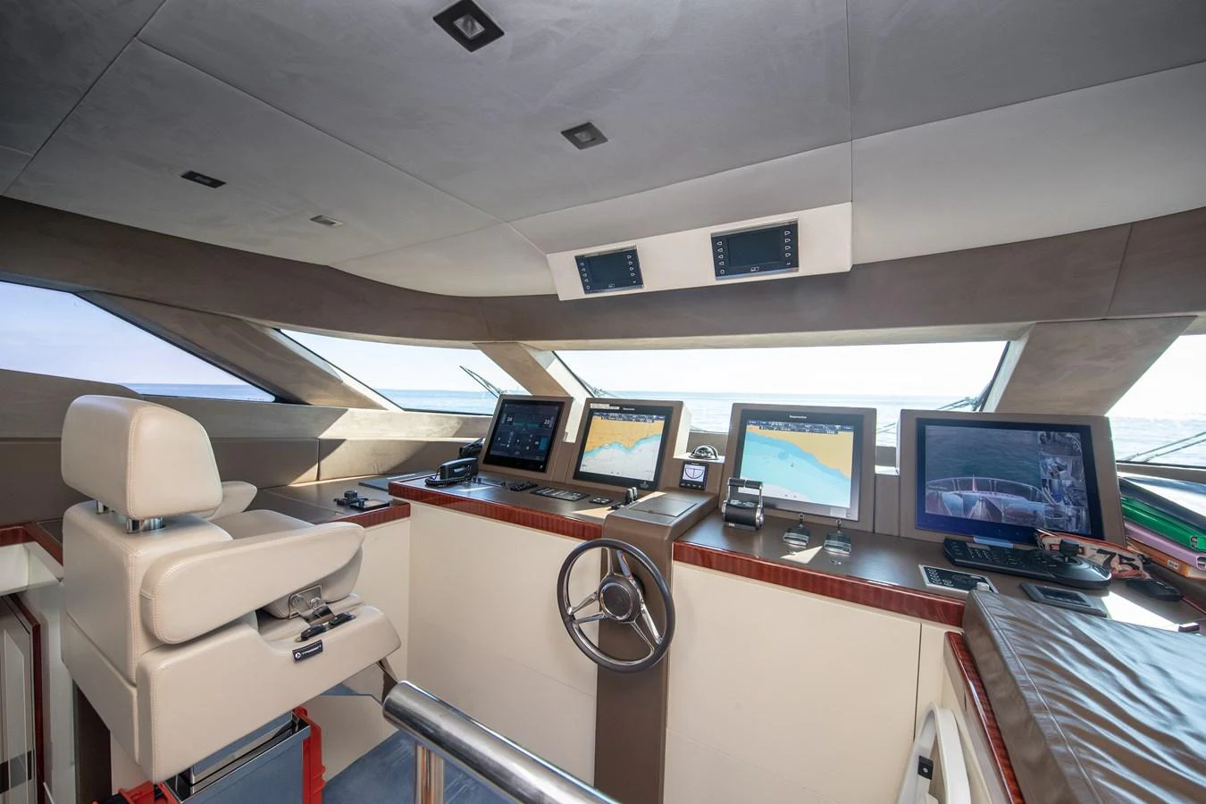 a room with computers and monitors aboard LADY MARISA Yacht for Sale