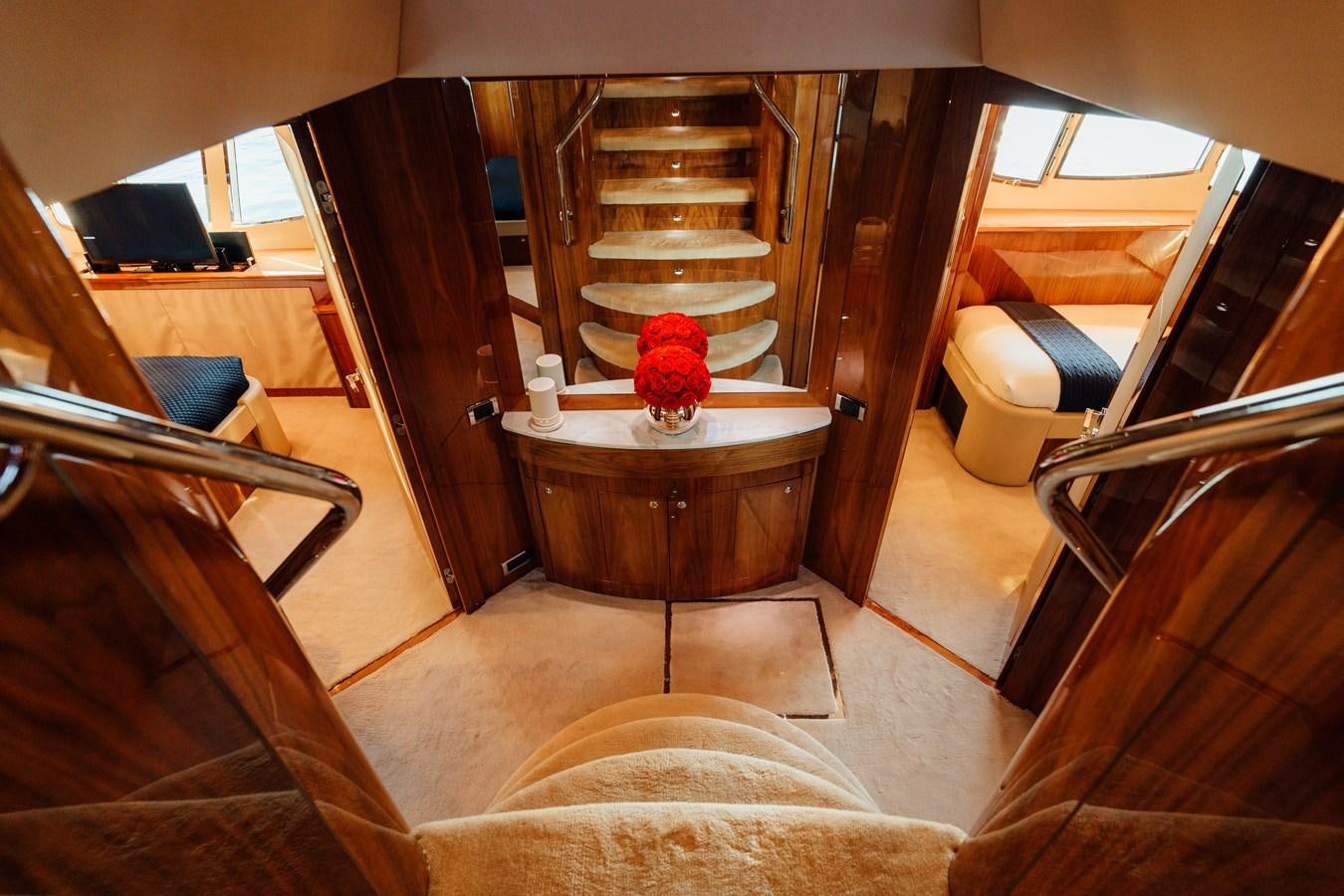 a room with a table and chairs aboard CHAOS Yacht for Sale