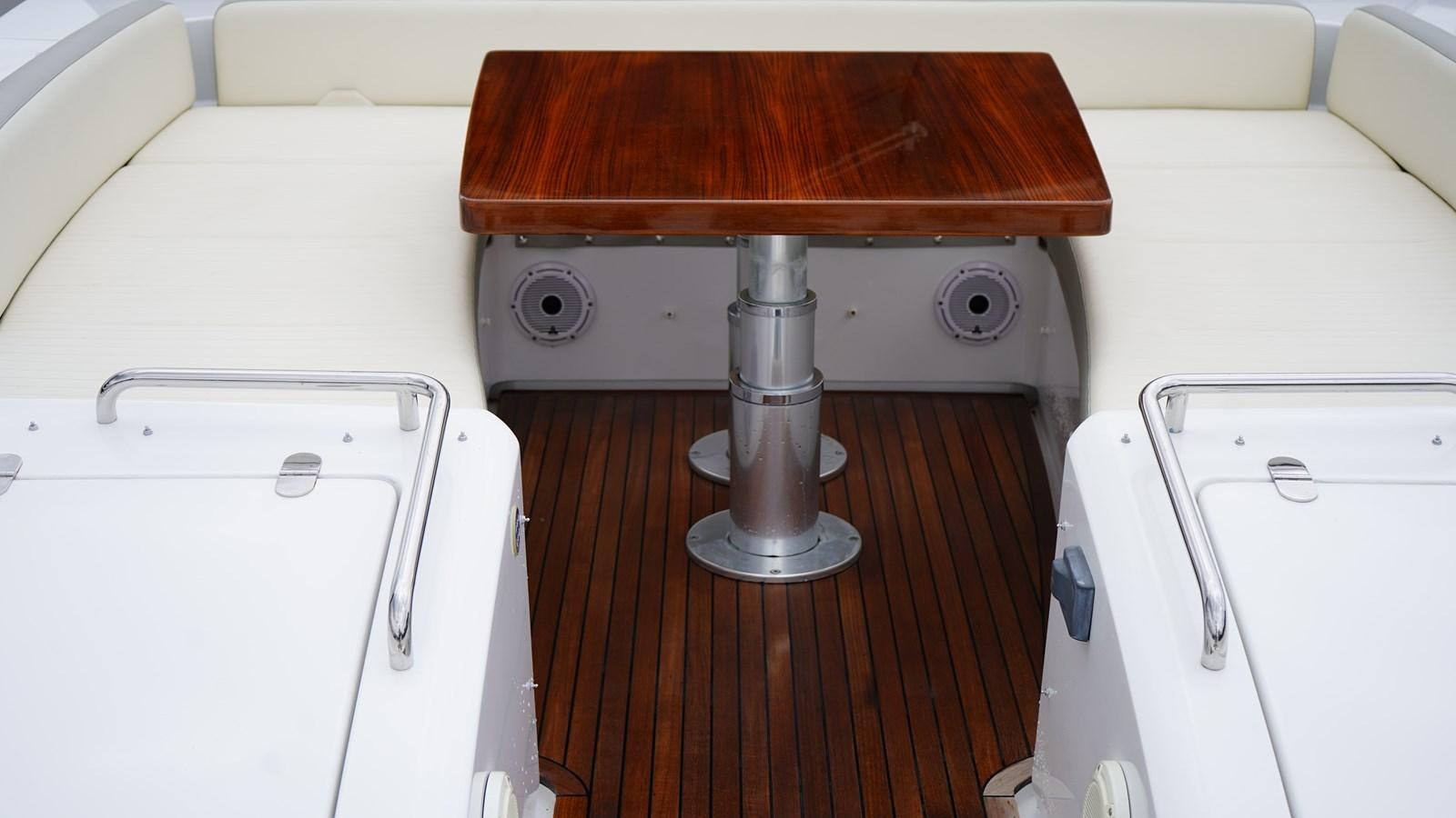 a table with a drawer aboard RAINBOW GODDESS Yacht for Sale