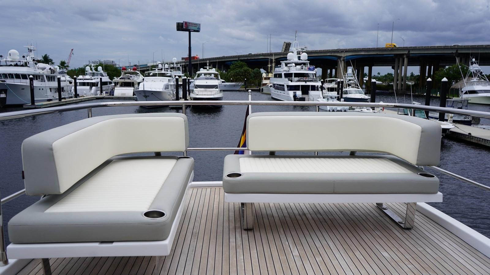 a boat on a dock aboard RAINBOW GODDESS Yacht for Sale