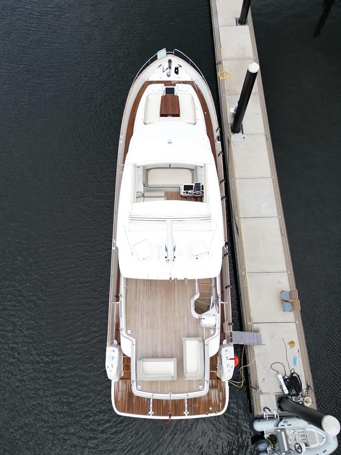 a white and brown boat aboard RAINBOW GODDESS Yacht for Sale