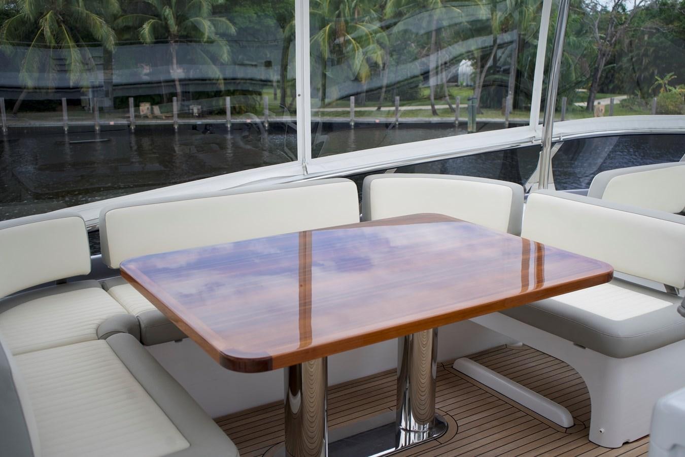a table on a boat aboard RAINBOW GODDESS Yacht for Sale