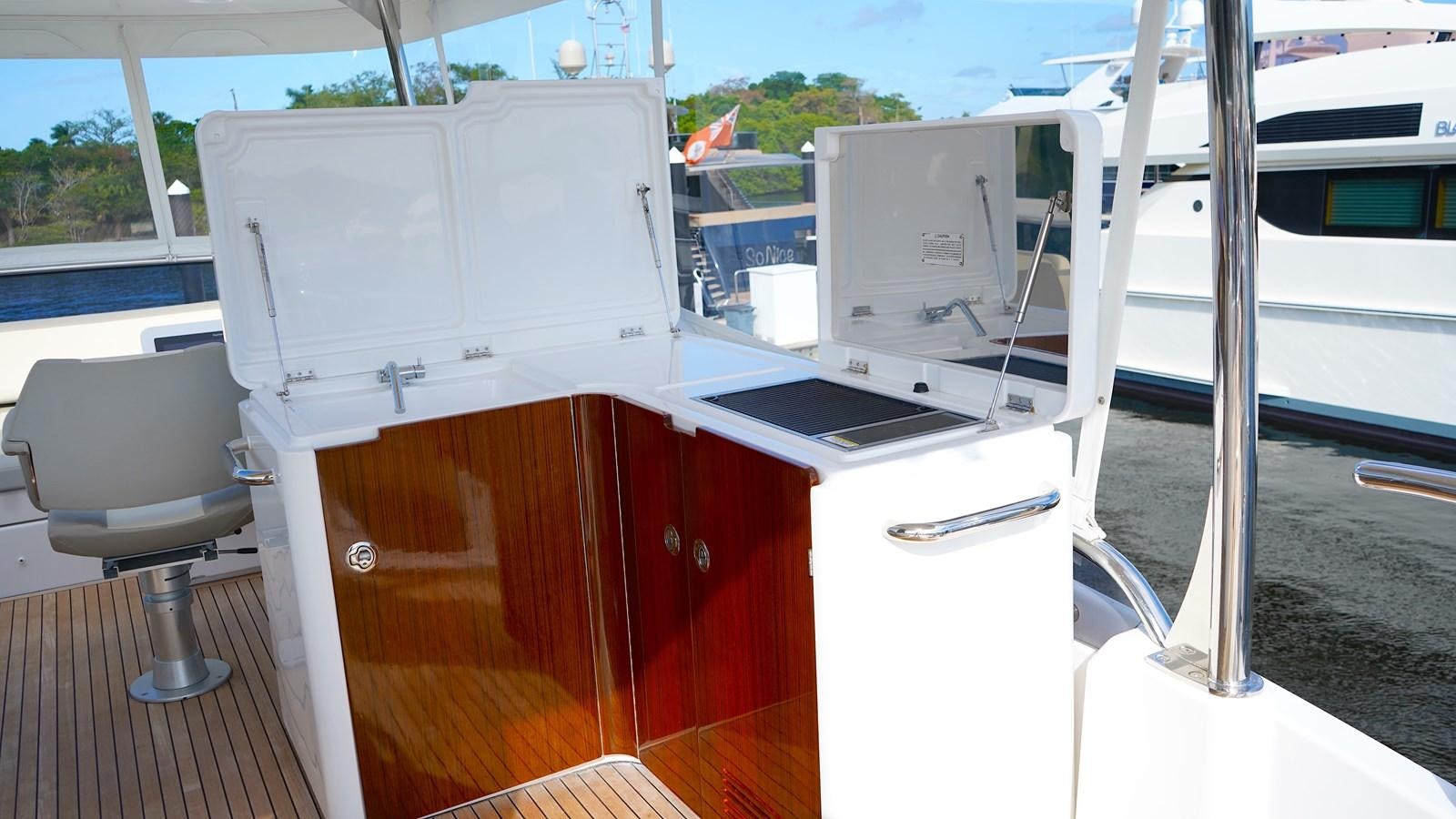 a group of white refrigerators aboard RAINBOW GODDESS Yacht for Sale
