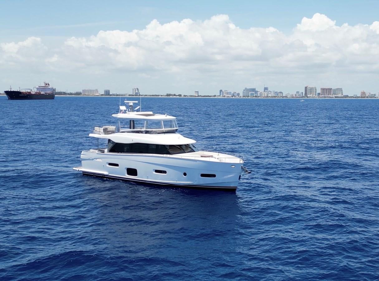 a white yacht in the water aboard RAINBOW GODDESS Yacht for Sale