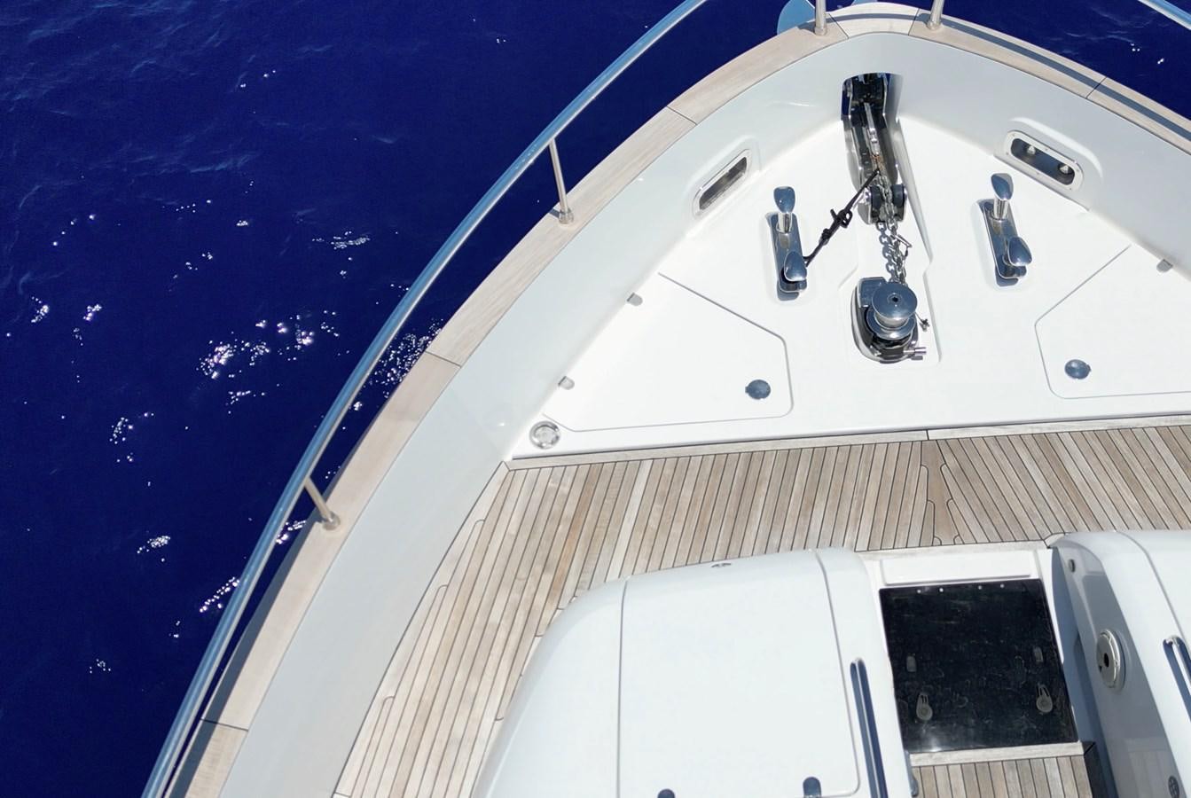 the front of a white boat aboard RAINBOW GODDESS Yacht for Sale