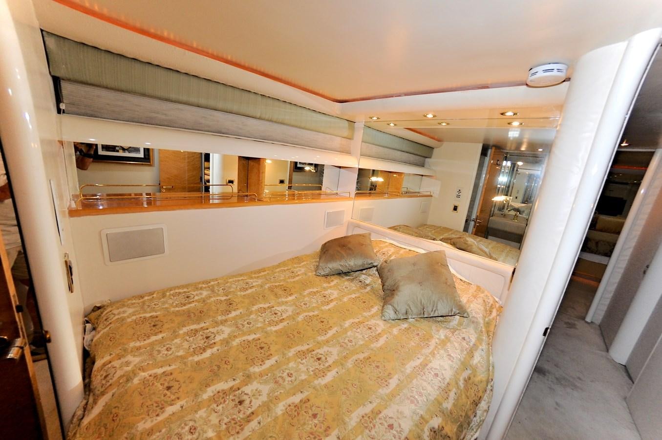a bed in a room aboard CAMY Yacht for Sale