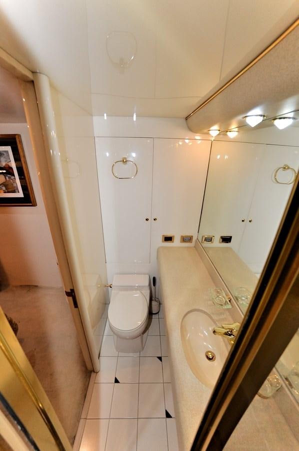 a bathroom with a sink and a toilet aboard CAMY Yacht for Sale