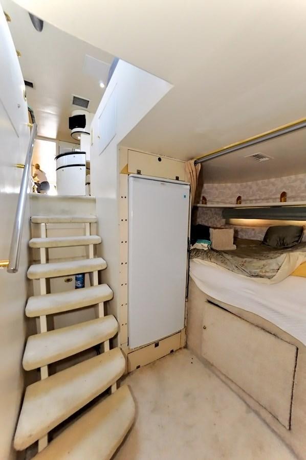 a room with bunk beds aboard CAMY Yacht for Sale