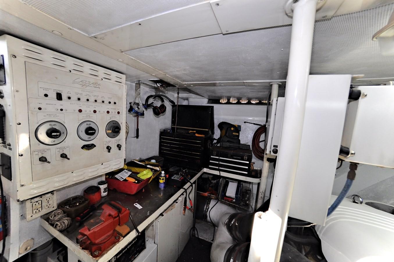 a room with a machine and other objects aboard CAMY Yacht for Sale