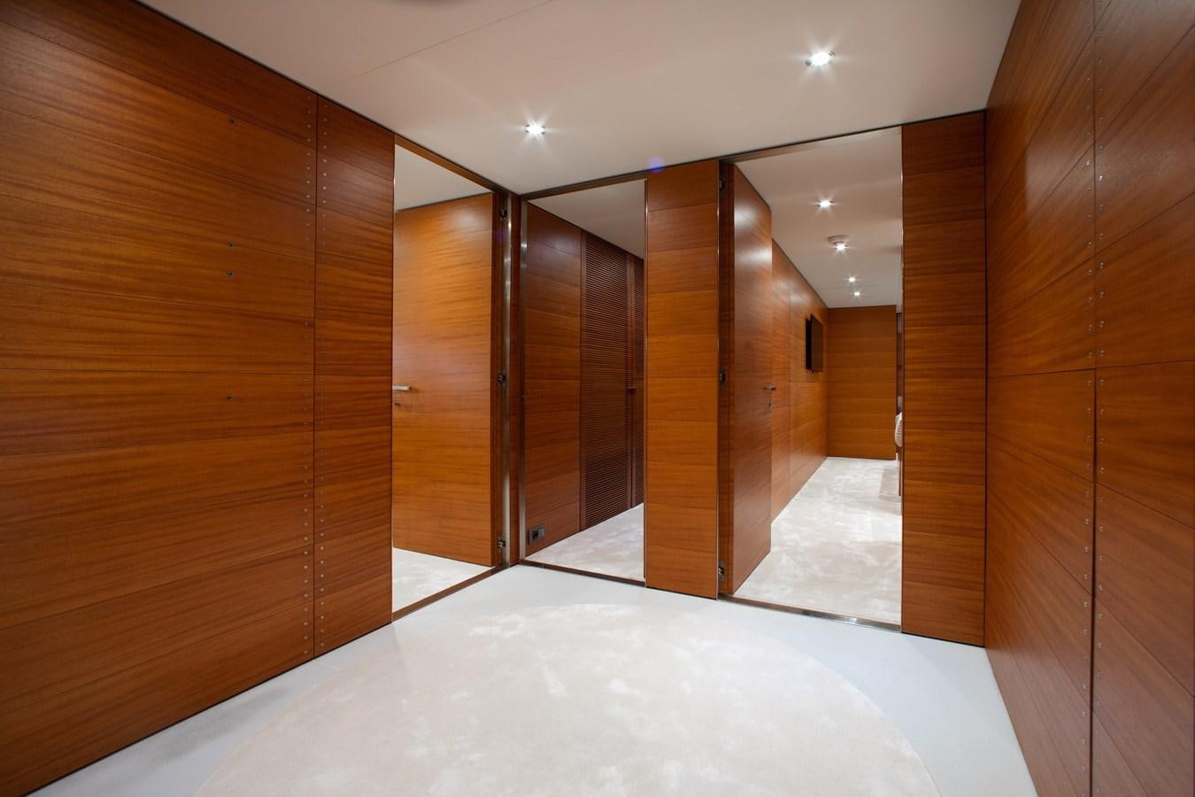 a room with a large mirror aboard BLUE ICE Yacht for Sale