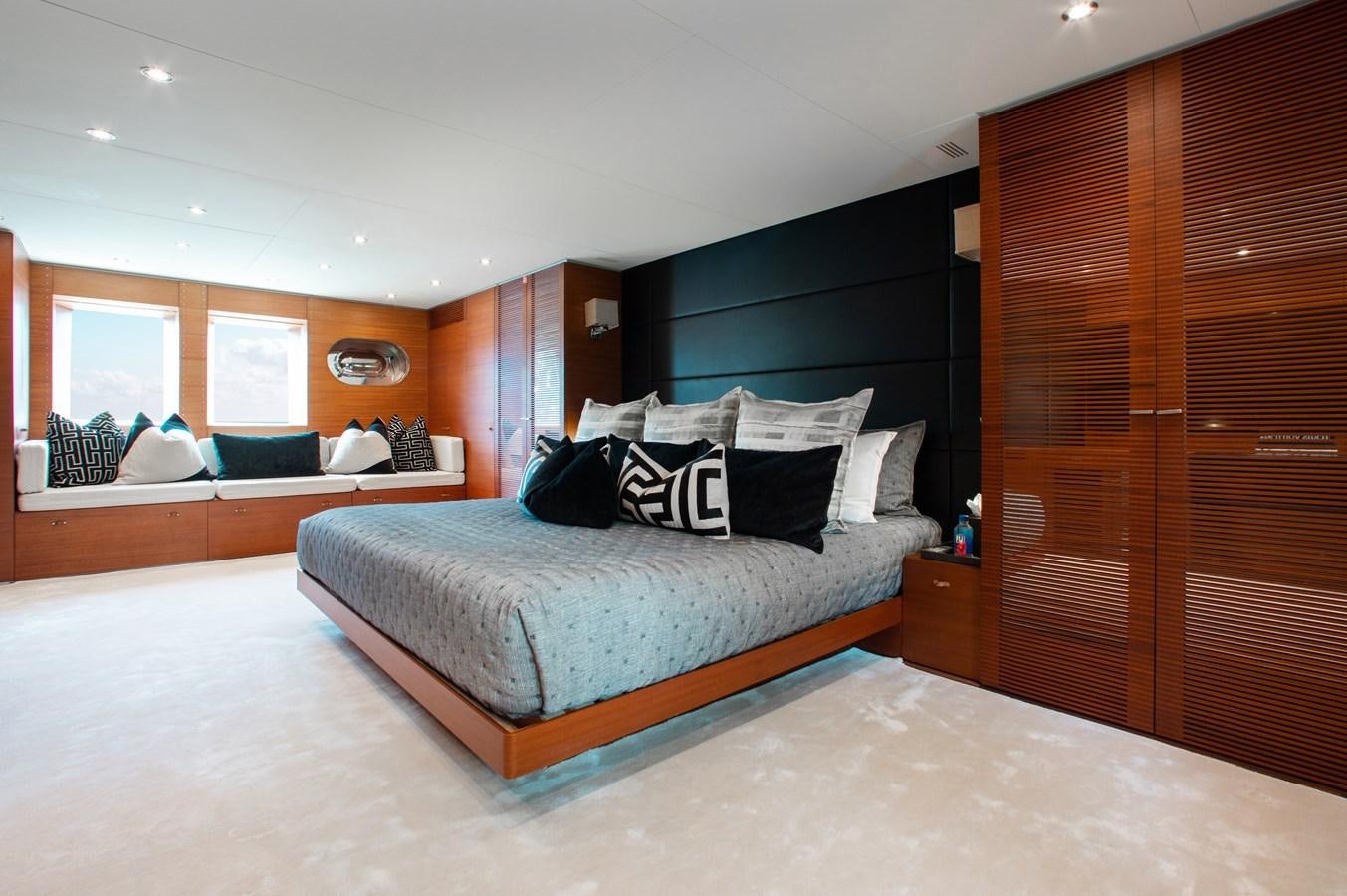 a large bed in a room aboard BLUE ICE Yacht for Sale