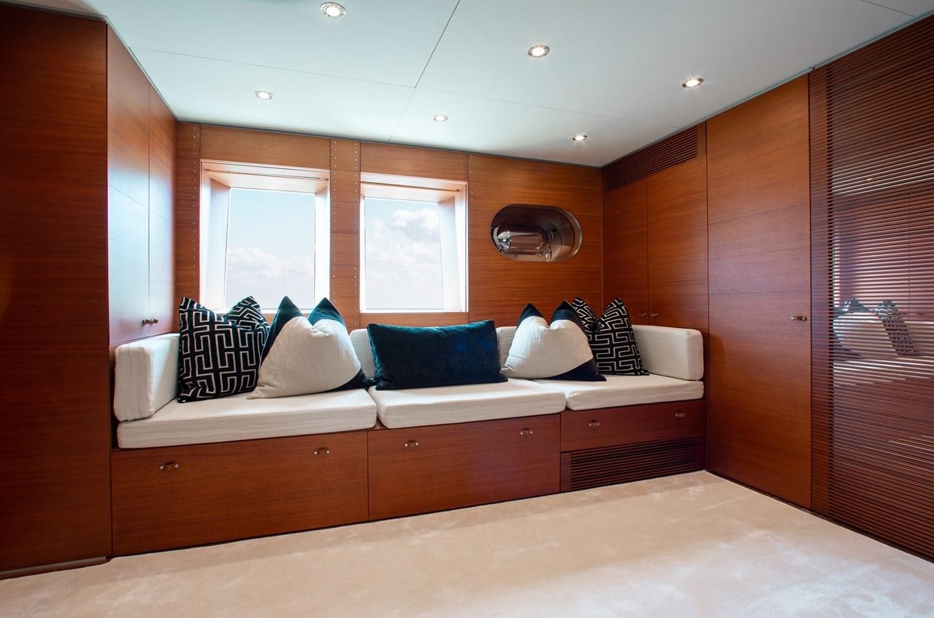 a bed with pillows and pillows aboard BLUE ICE Yacht for Sale