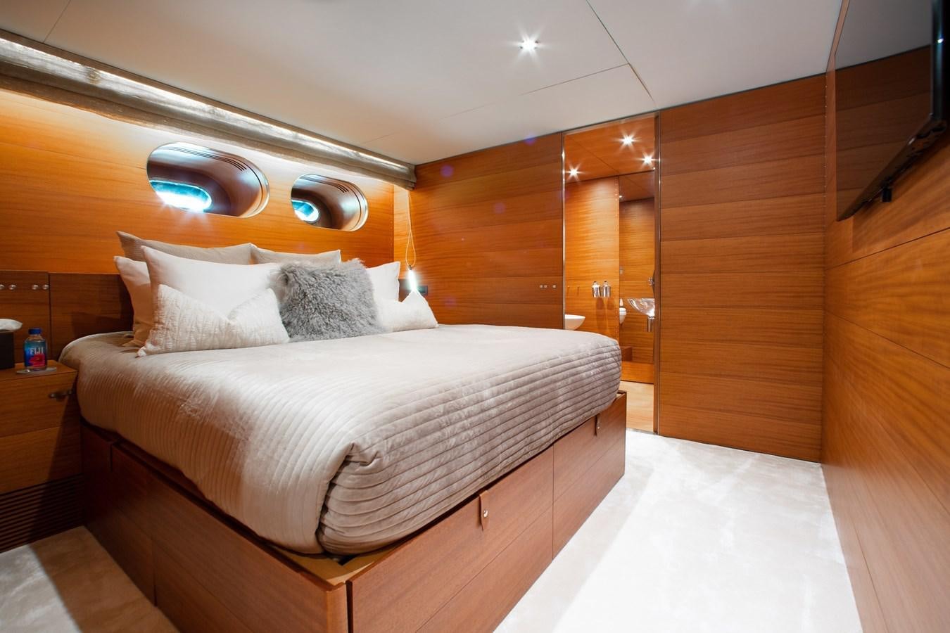 a bed in a room aboard BLUE ICE Yacht for Sale
