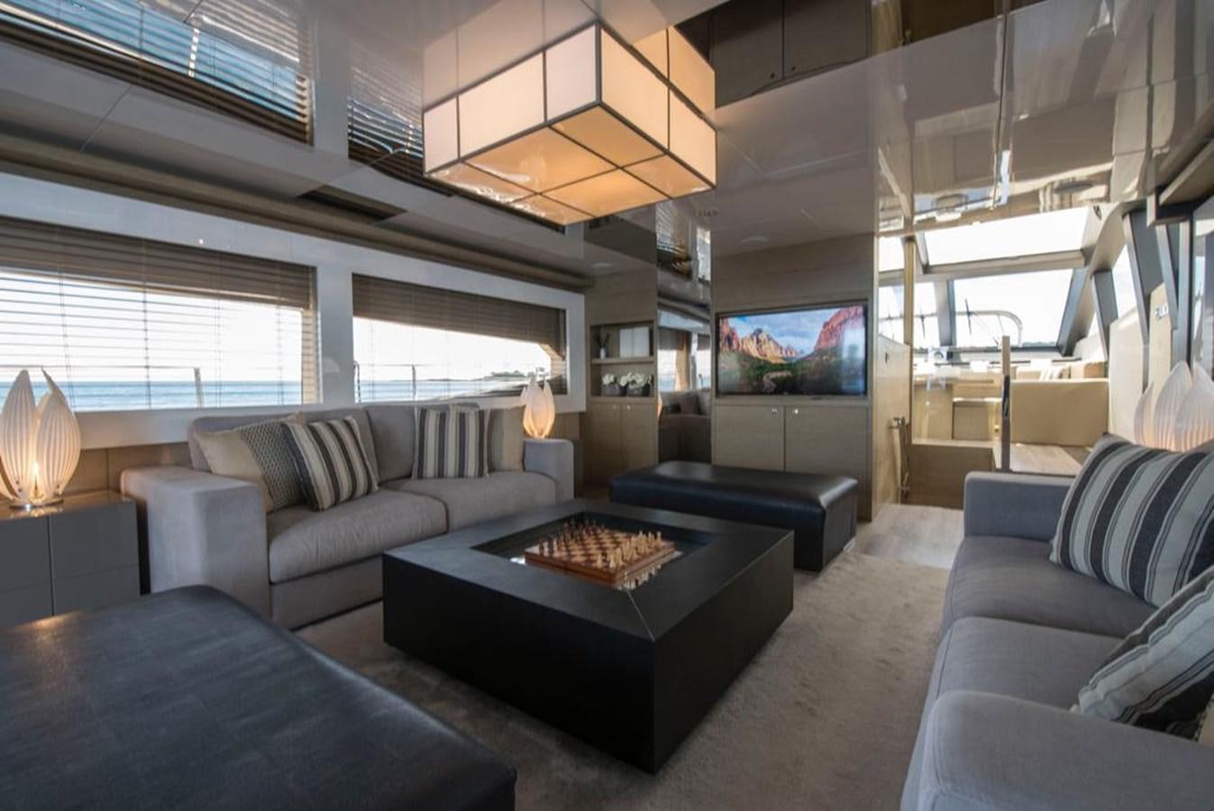 a living room with a large window aboard SUMMER BREEZE Yacht for Sale