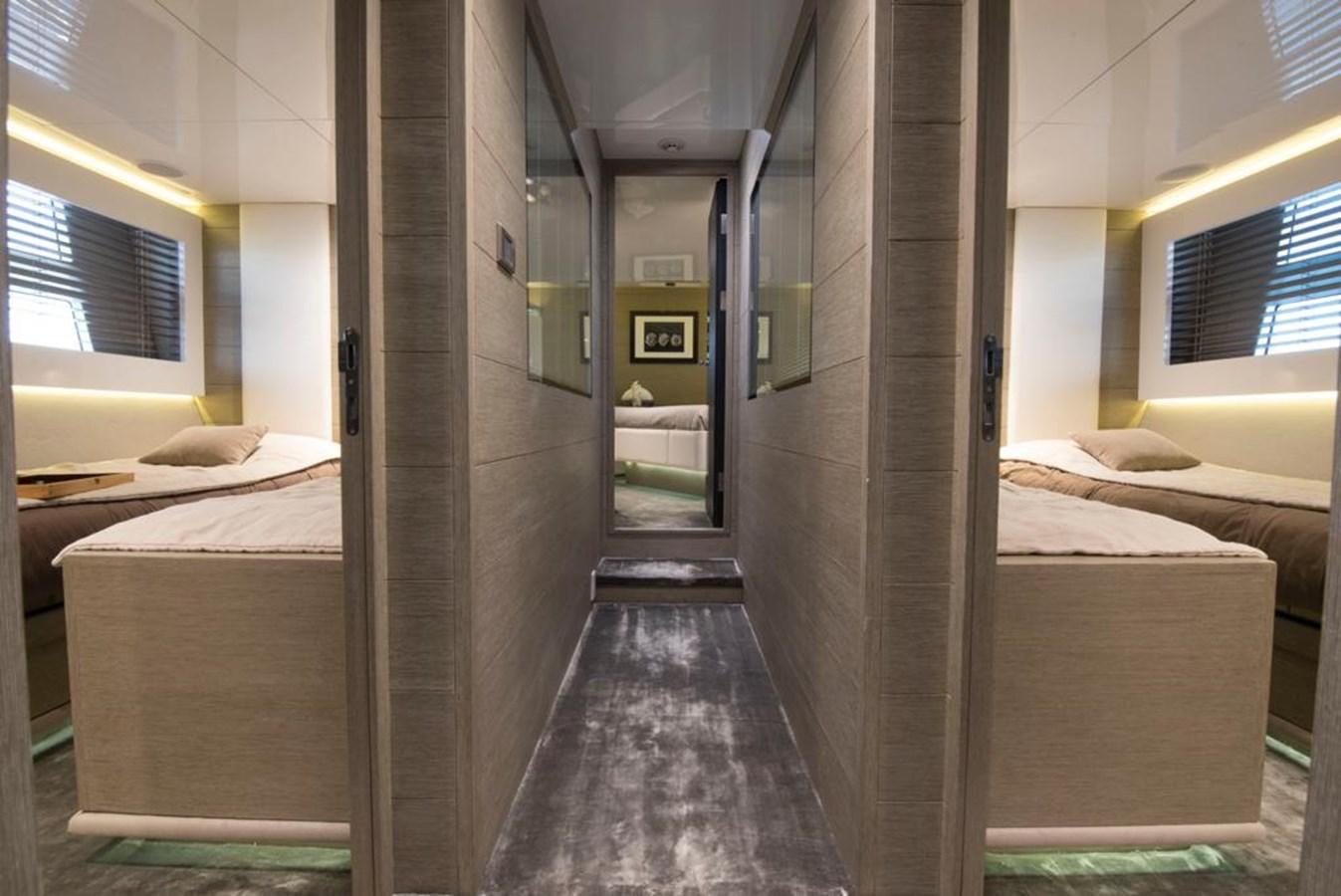 a room with a couple of beds aboard SUMMER BREEZE Yacht for Sale