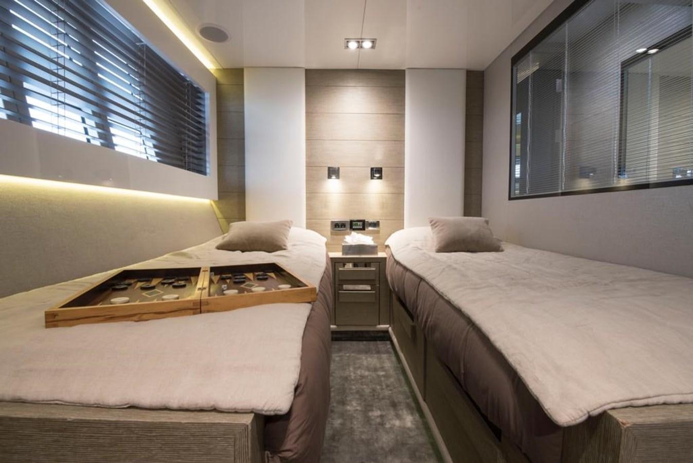 a room with two beds aboard SUMMER BREEZE Yacht for Sale