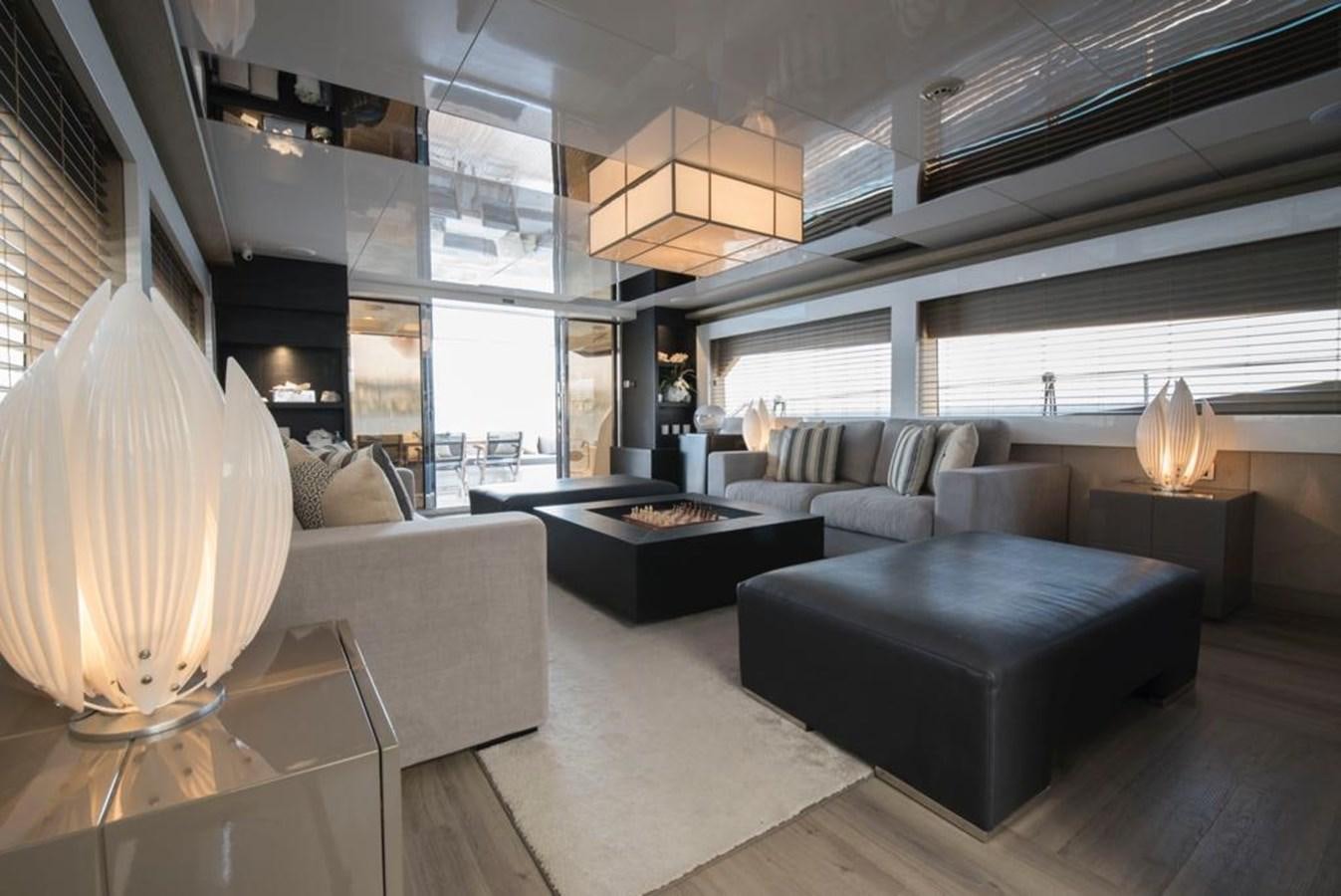 a room with a couch and a table aboard SUMMER BREEZE Yacht for Sale