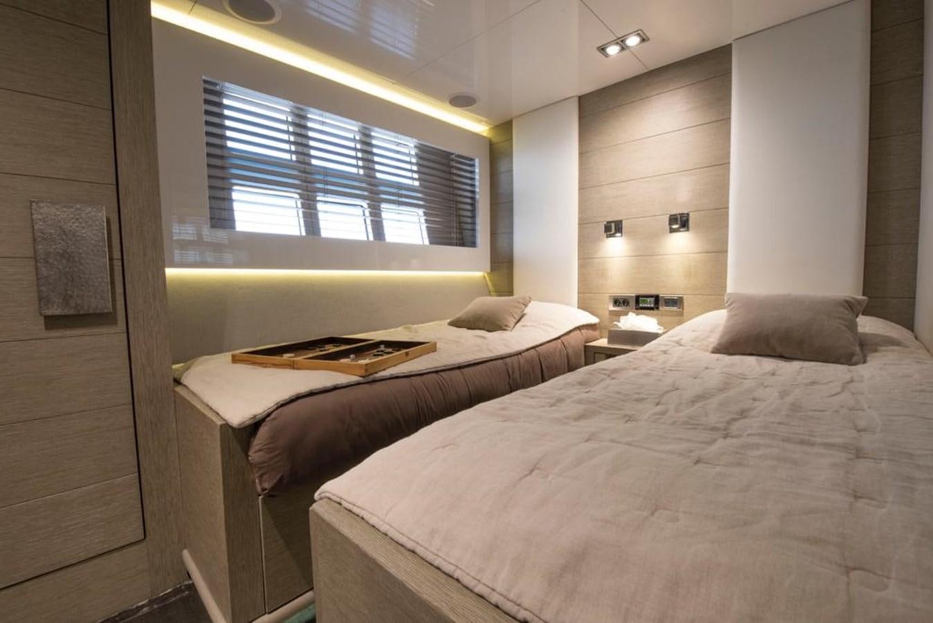 a room with two beds aboard SUMMER BREEZE Yacht for Sale